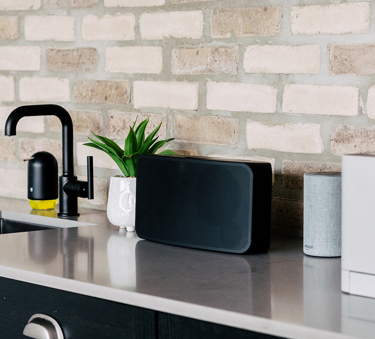 Bluesound Pulse Mini on a kitchen counter